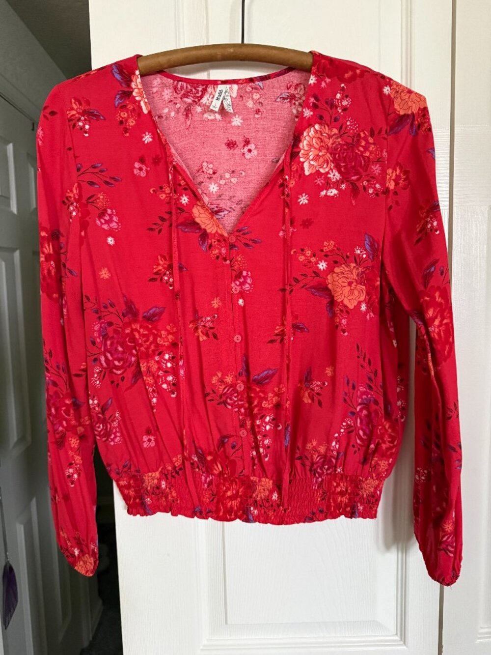 Smocked hem wrap top
